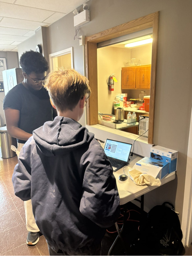 Young people participating in a technology learning session